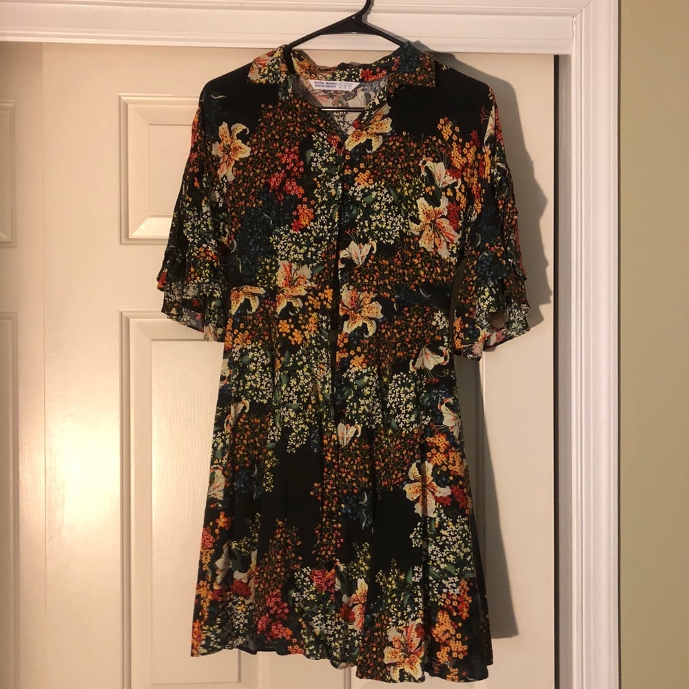 A cute button up multi colored mini dress